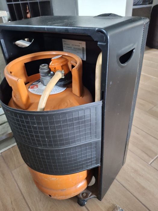 Aquecedor a gás com botija.