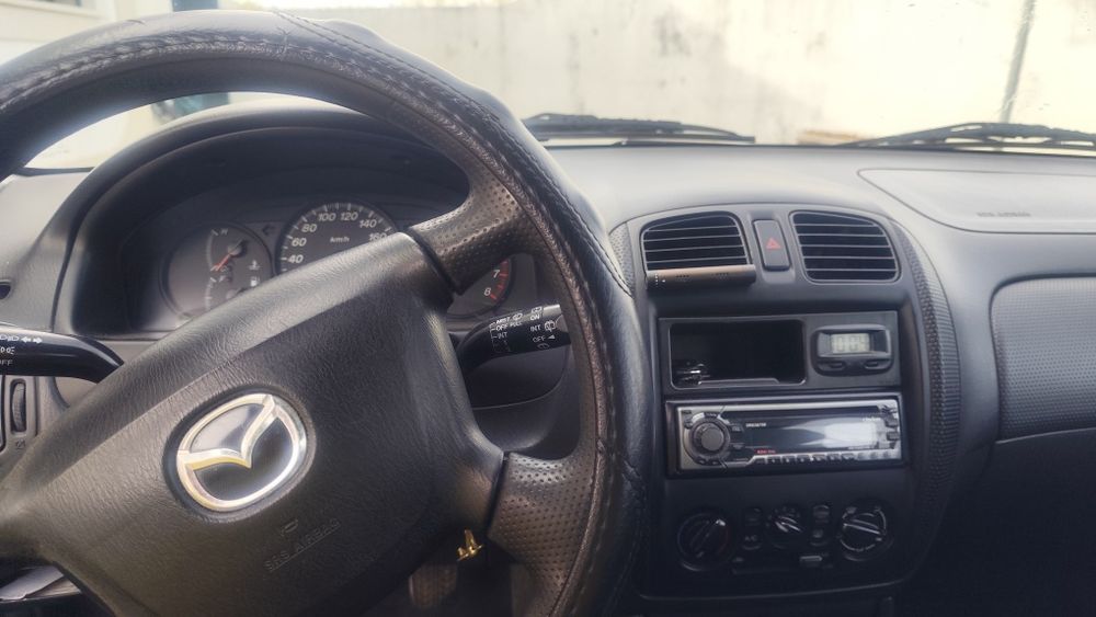 Mazda 323f 1.5 gasolina/gpl