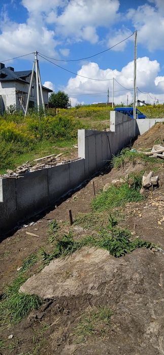 Огорожа,паркан,опорна стіна,бетони,бригада, фундамент під будівництво,фундаменті блоки