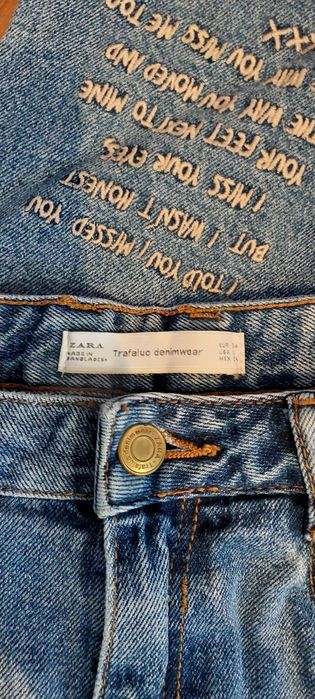 Spodnie jeansowe zara z dziurami