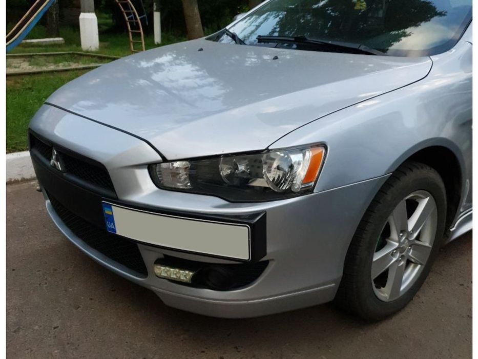 Mitsubishi Lancer X Подіум під номер чорний мат