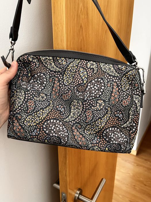 Mala tiracolo com bolso exterior