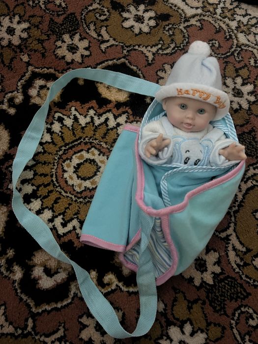 Лялька пупс.