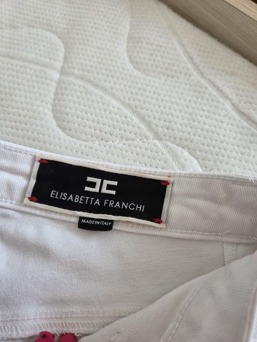 Rozszerzane białe jeansy Elisabetta Franchi