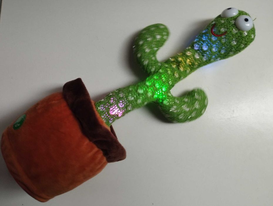 Boneco brinquedo cato, dança com musicas e repetidor