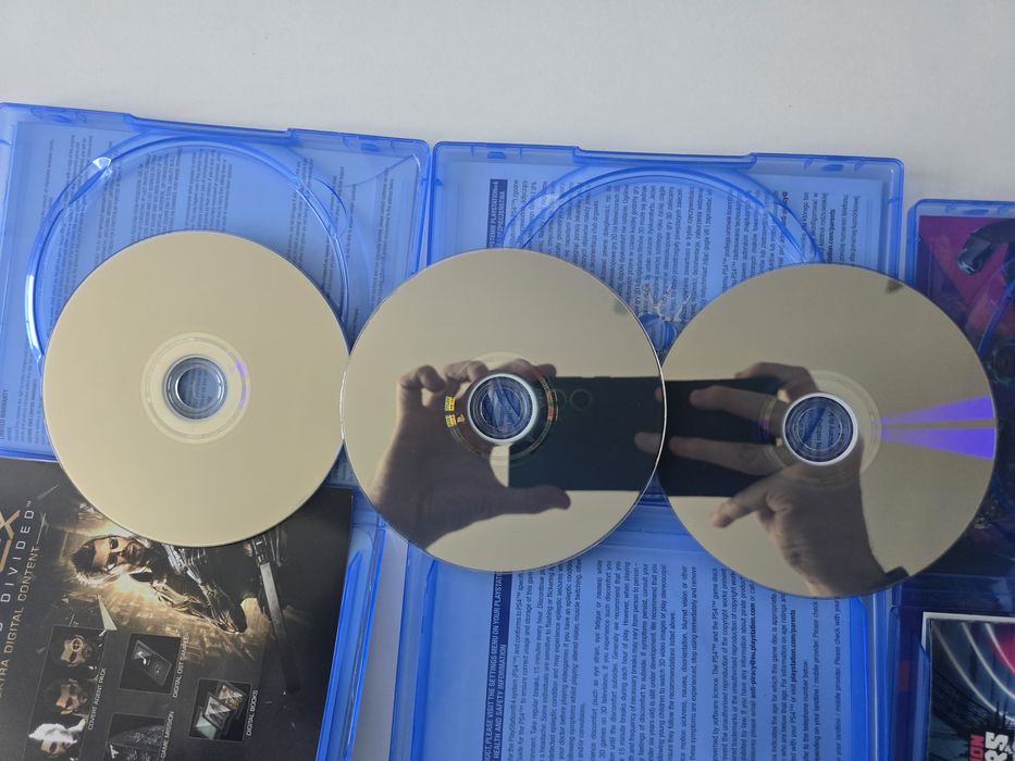 Gry PS4/Ps5 pudełka.  3 gry