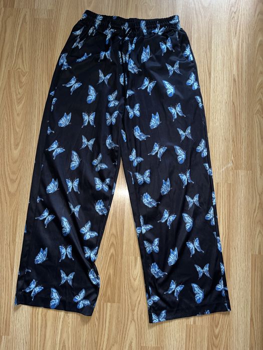 Круті та легкі штани з принтом метелика по всьому периметру