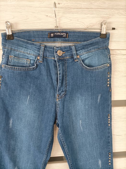 Nowe spodnie jeansowe z wysokim stanem dopasowane S/36 niebieskie