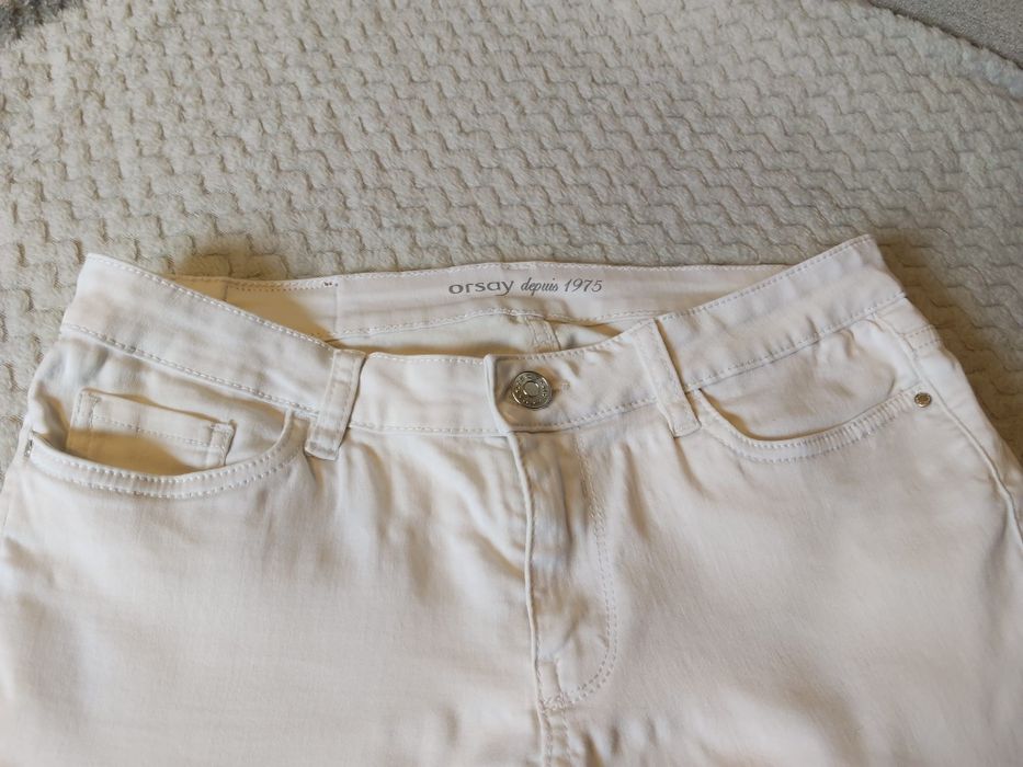 Białe jeansy damskie Orsay rozmiar 38