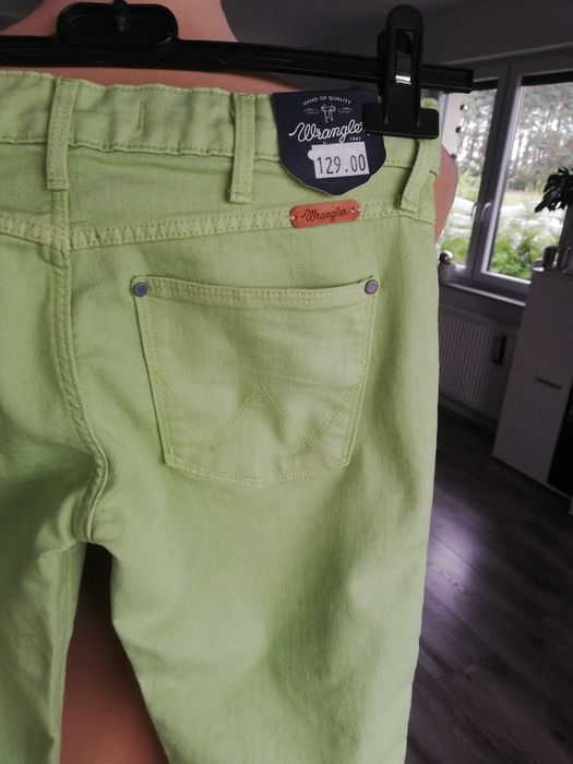 W25 L32 limonkowe nowe spodnie damskie jeansy rurki Wrangler