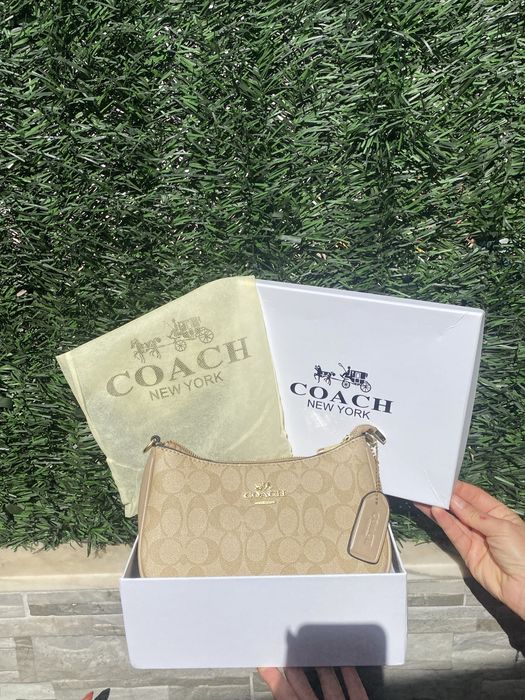 Mala Coach Nova, Com caixa.