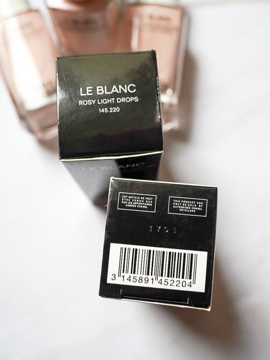 Рідкий хайлайтер сяюча база Chanel Rosy Light Drops Le Blanc