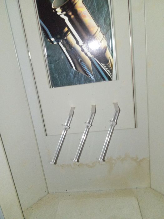 Expositor canetas Parker não sei se funciona a luz