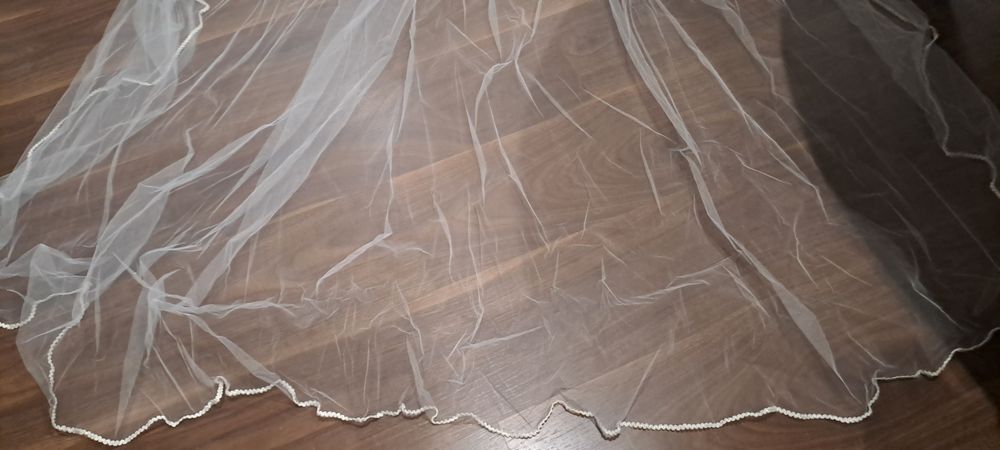 Vestido de noiva e véu