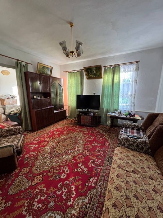 Продається будинок з гаражем деревяний обкладений цеглою вул. Київська