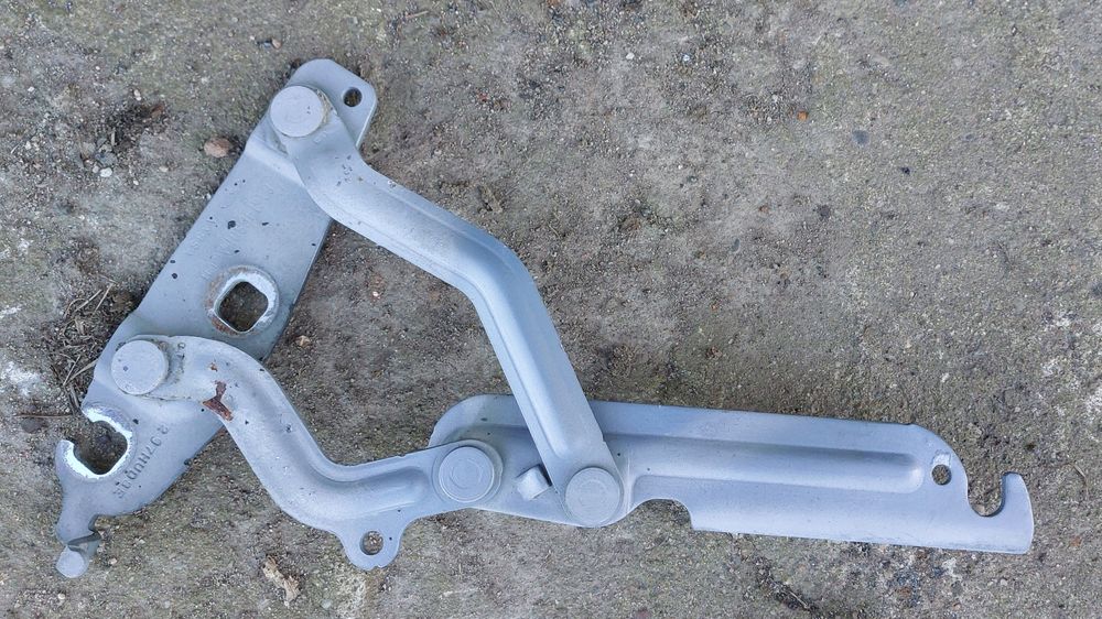 zawias maski lewy przód przedni ford fiesta mk7 8a6116801ad m79