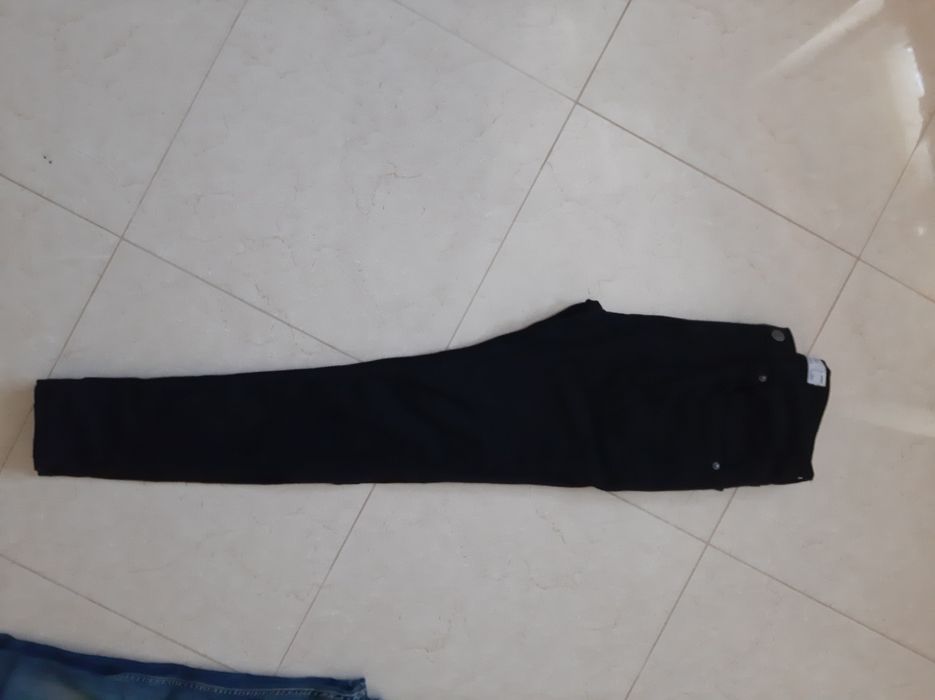 Calças pretas homem