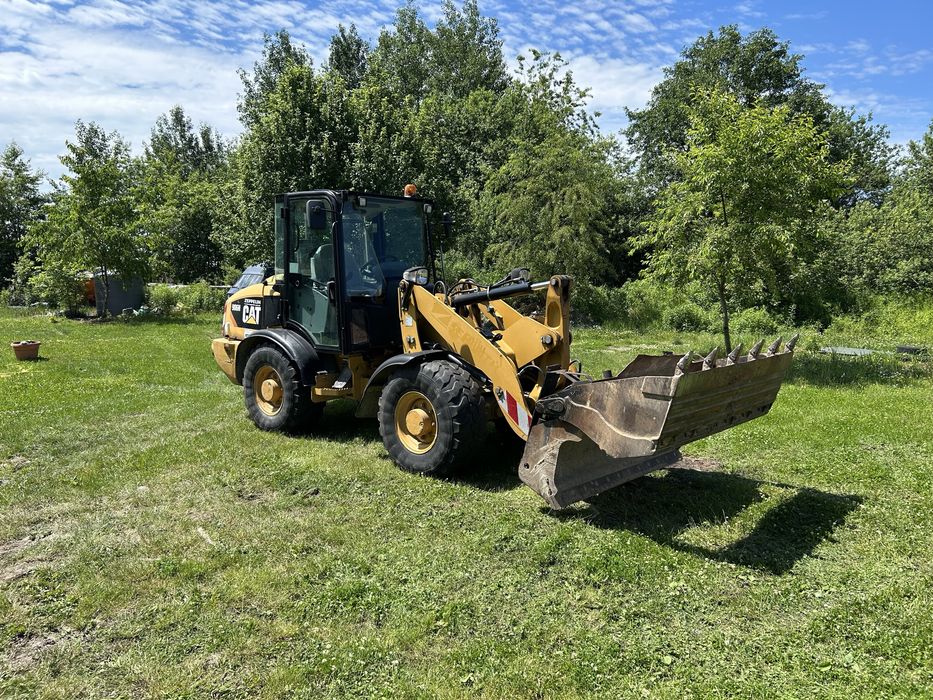 Caterpillar CAT 906H ładowarka z Niemiec + widły