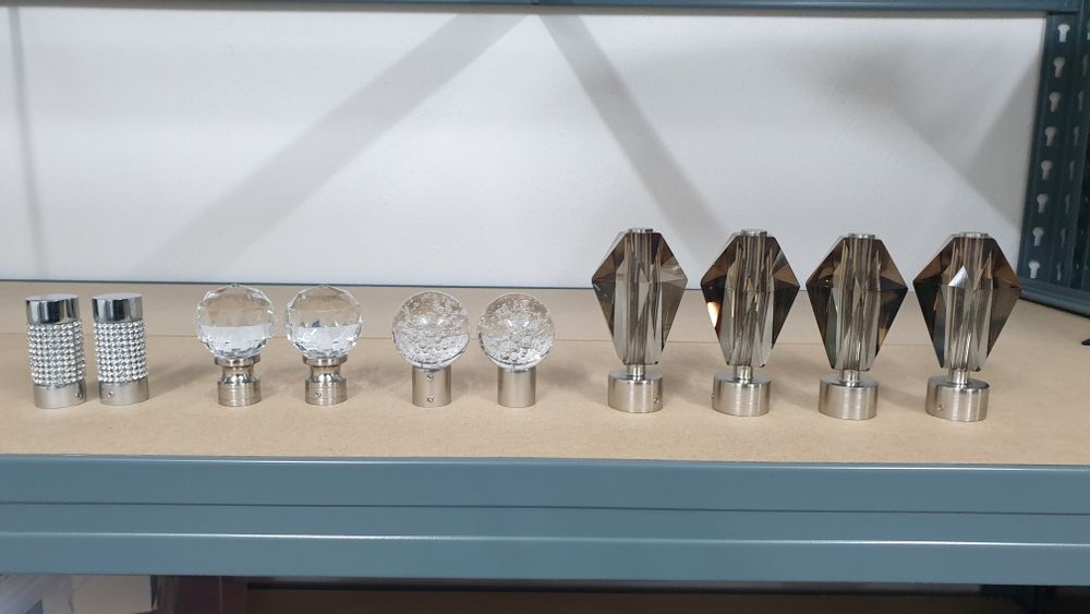 Pontas de varão para cortinados