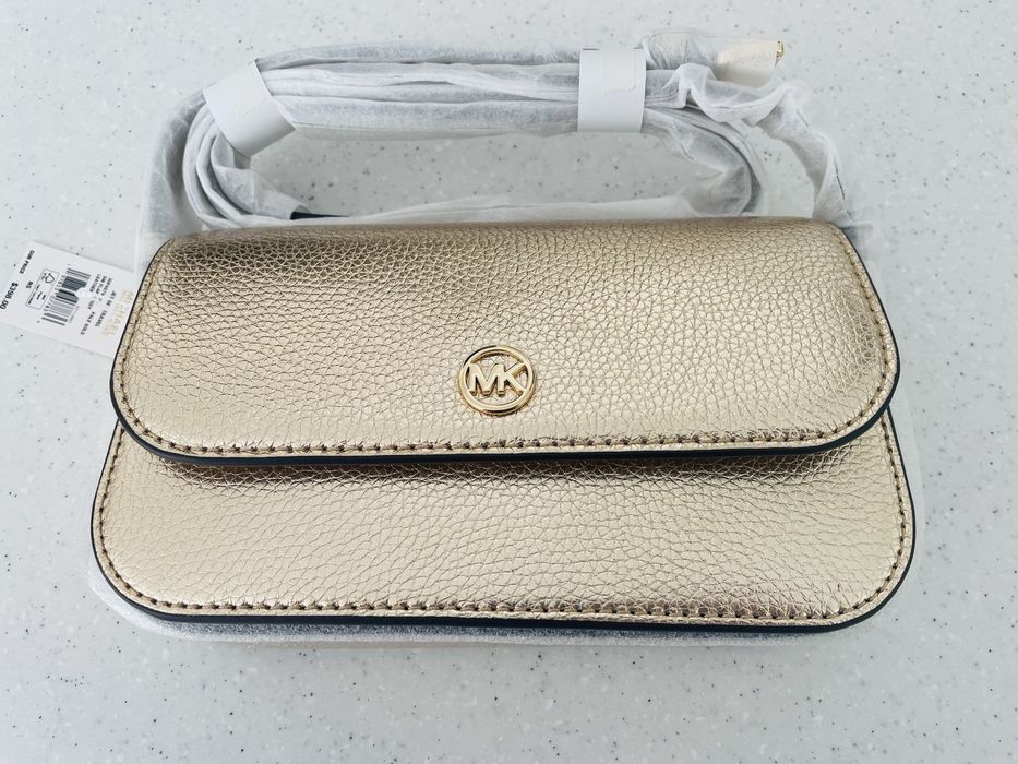 Нова сумка Michael Michael Kors Jet Set Travel, натуральна шкіра, колір pale gold, оригінал, є невеликий дефект.