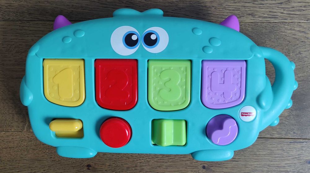 Fisher-Price Stworek Z Niespodziankami Dym89