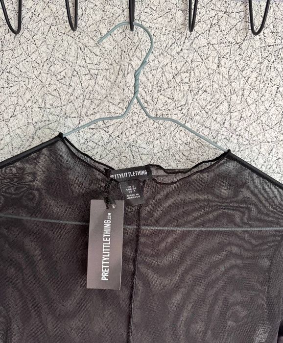 Чорне боді в сітку