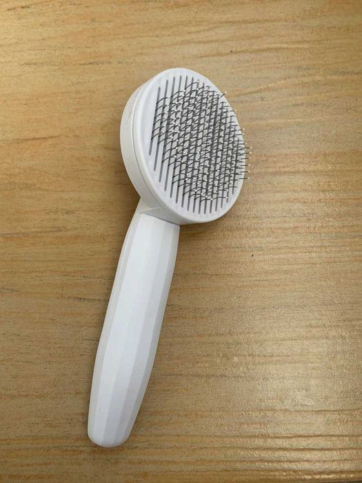 Щітка для тварин