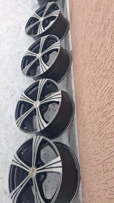 Оригінальні диски титани Dezent 5/108R17 Germany