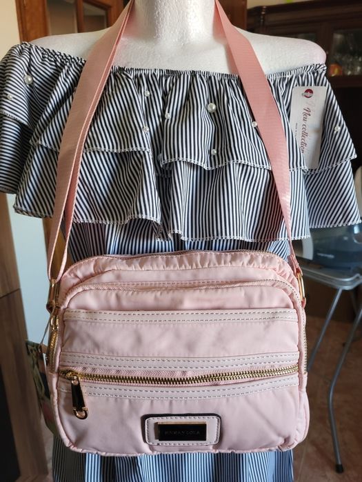 Mala tiracolo rosa bebé nova