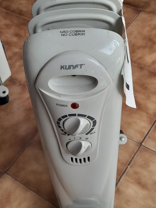 Aquecedor a óleo com 6 elementos a funcionar lindamente marca Kunft