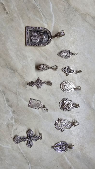 Серебрянные кулоны,крестики