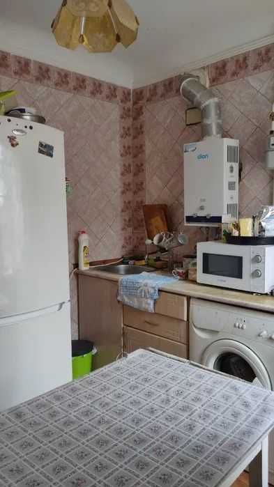 Однокімнатна квартира в цегляному будинку.