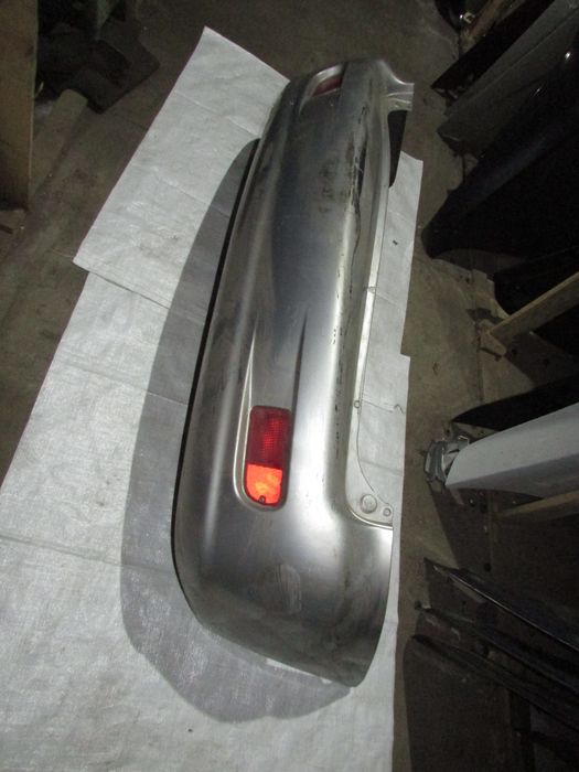 Комплект кришка багажніка ліхтар бампер задній Шевроле такума ta