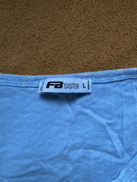 Jasno niebieski crop top FB Sister