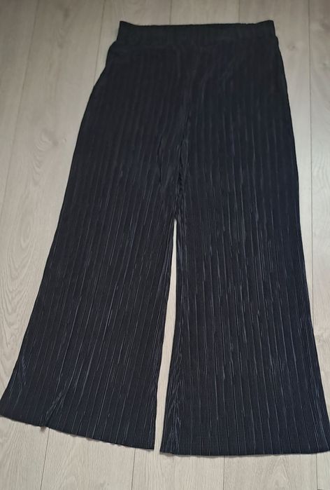 Eleganckie spodnie w prążki na wysoką osobę