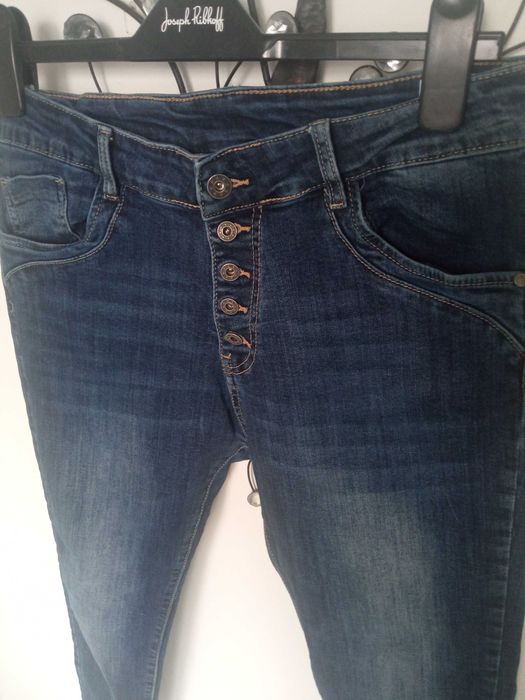 Melly & Co damskie spodnie jeans r L pas 80-90cm