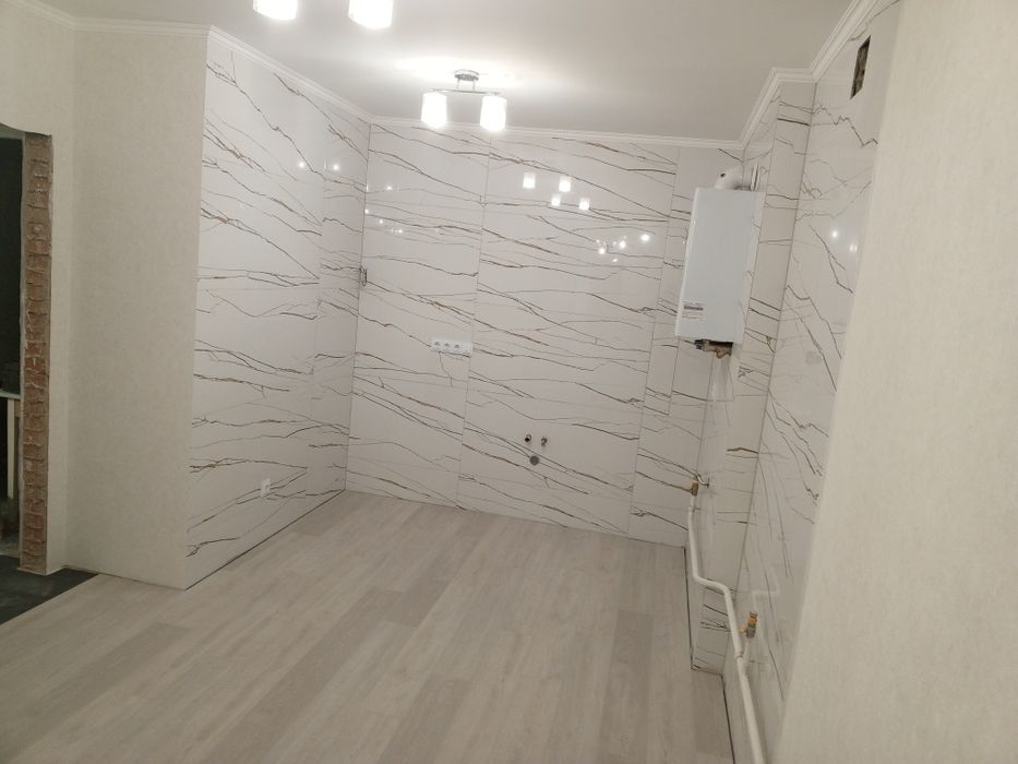 Укладання плитки, плиточник