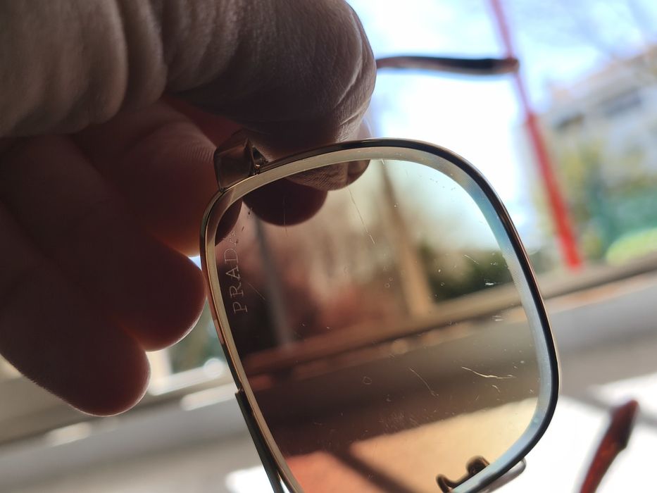 óculos de sol Prada