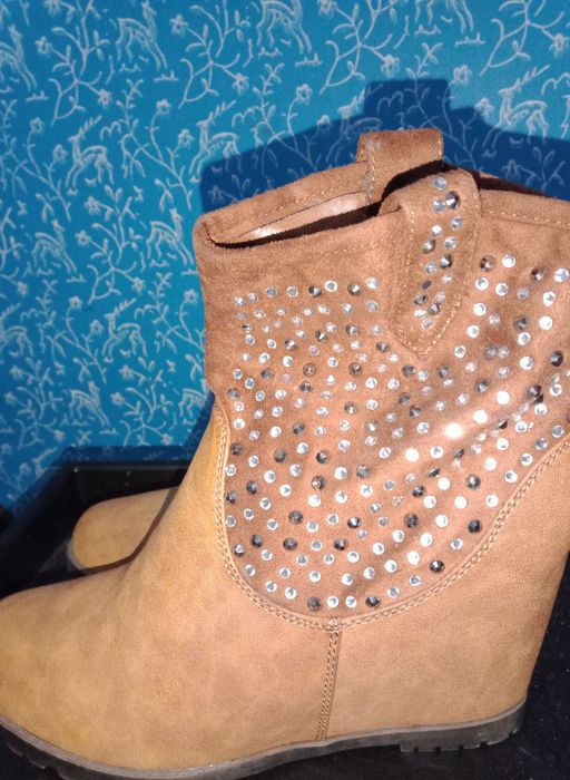 Botas Cano baixo novas