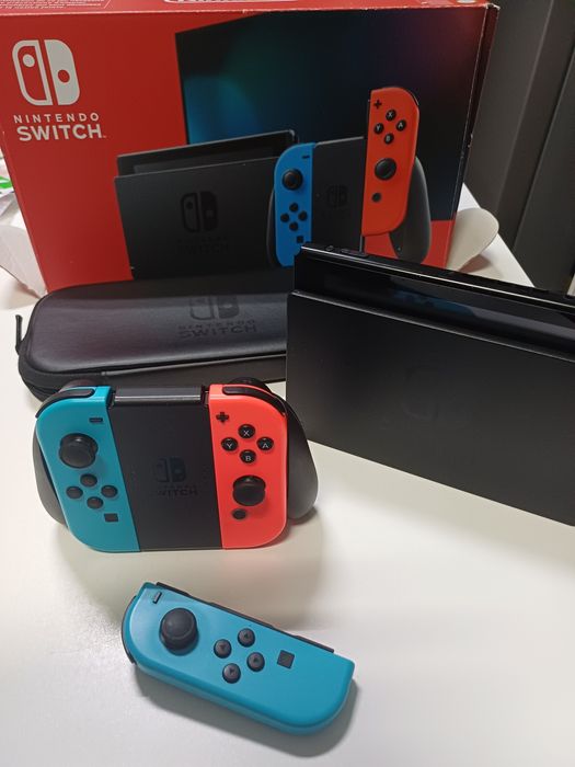 Nintendo + comando extra + bolsa