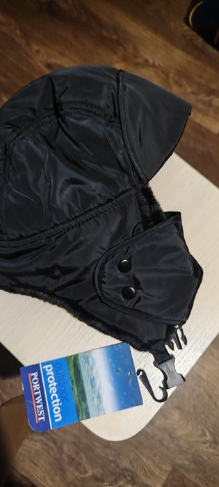 Теплі шапки-вушанки на зиму.