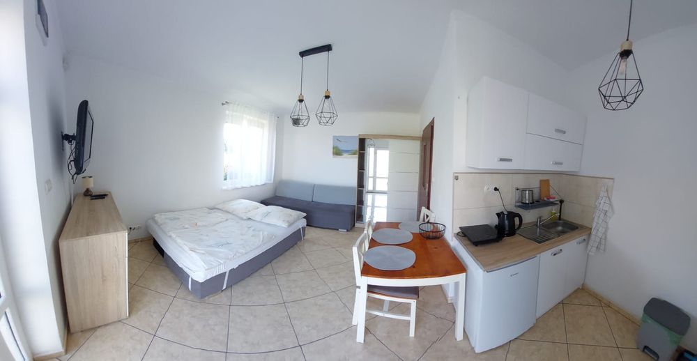 Pokoje i apartamenty Promyk Rowy