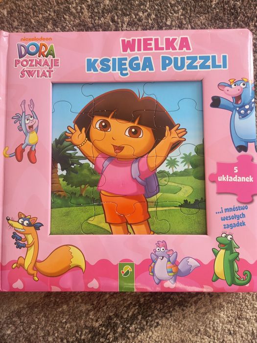 Dora poznaje świat - książka z puzzlami