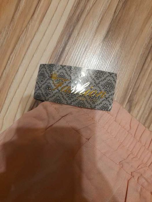 Zwiewne różowe dresy poliester włoskie rozm M