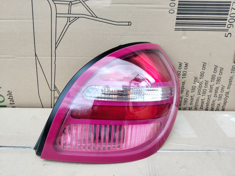 Nissan almera n16  lampa prawa tylna tył wkład kompletna 00-06