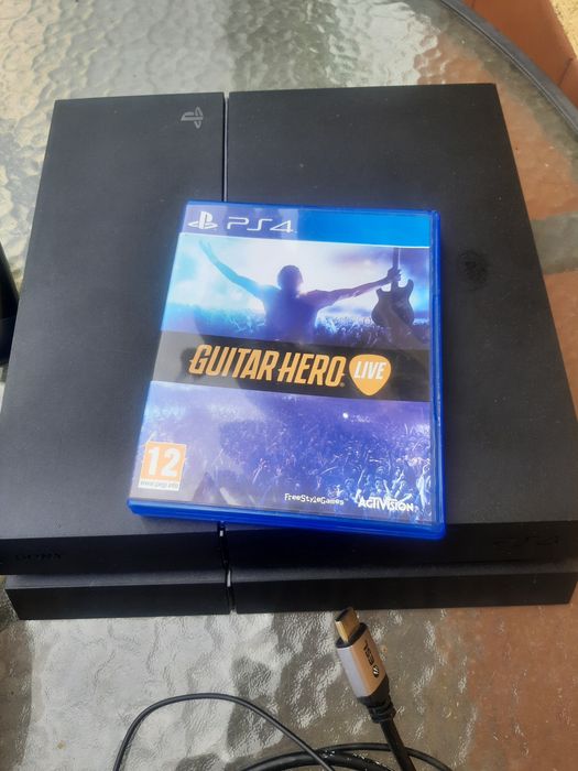 Konsola Ps4 .pad 3szt.gitara .. gry 2szt