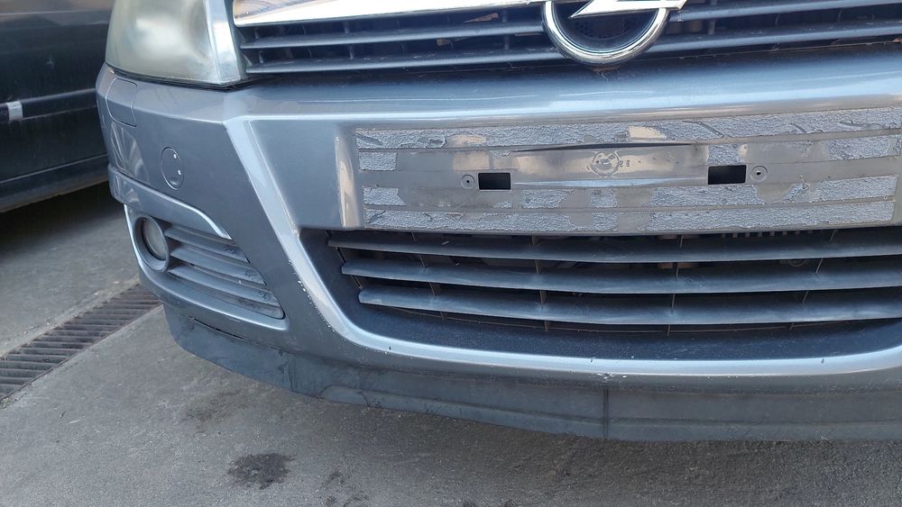 Pára-choques frente OPEL Astra H Caravan (L35)