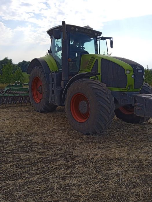 Трактор Claas Axion 950 2012  Продаж