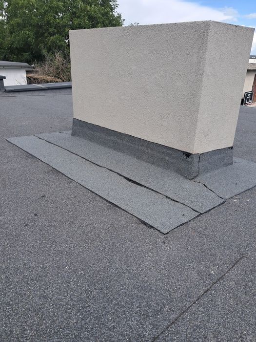 Montaż pap termozgrzewalnych,  grzanie papy , ukladanie papy .