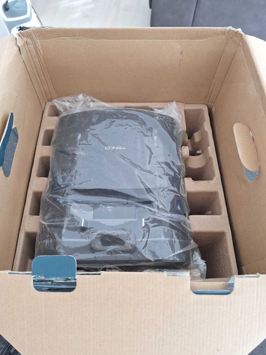 Aspirador robot com depósito